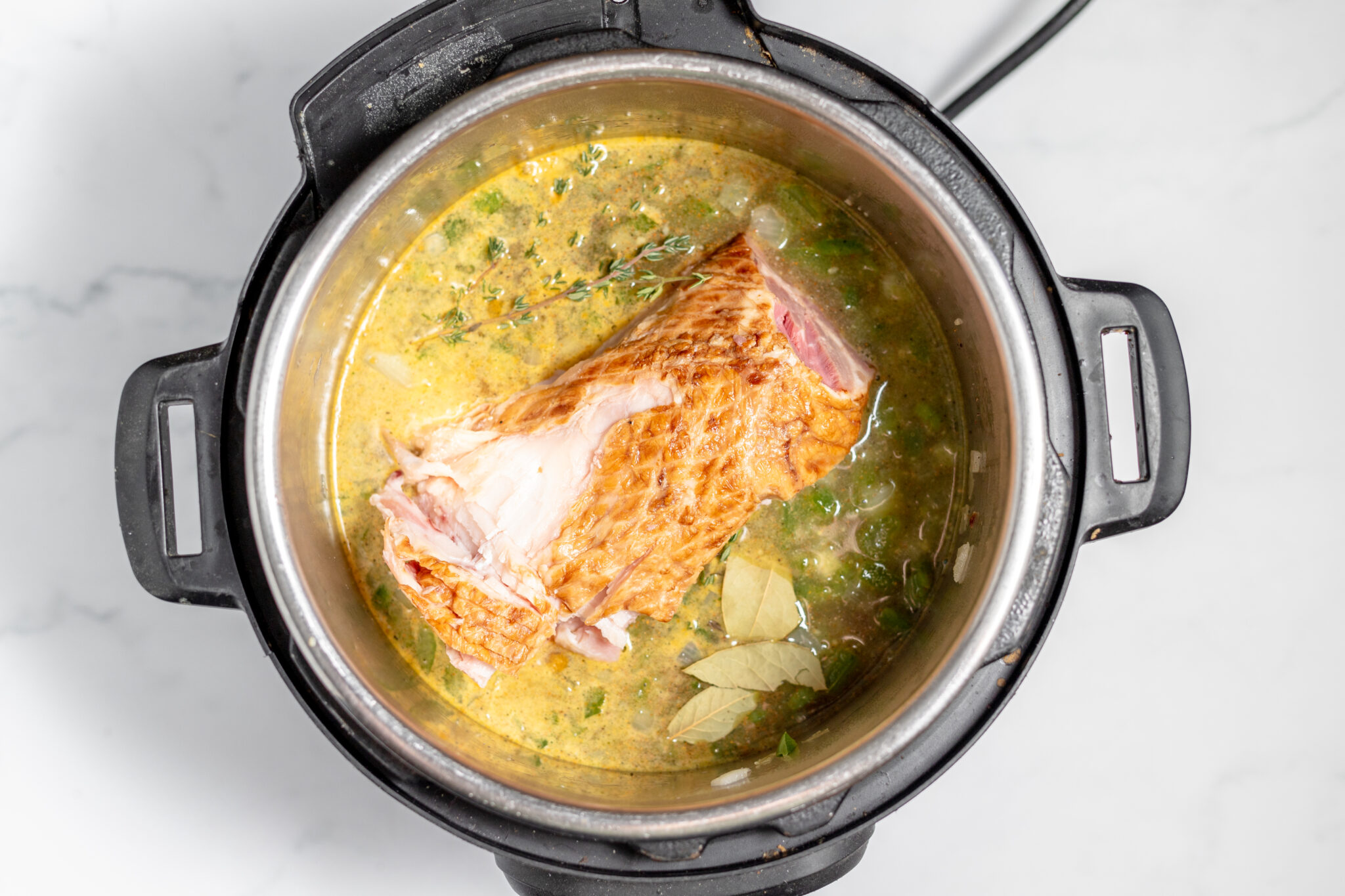 ham hock added to instant pot for red beans and rice