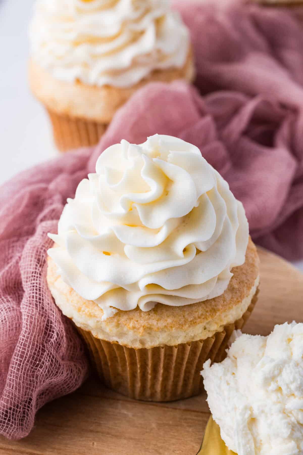 cream cheese frosting on a cupcake