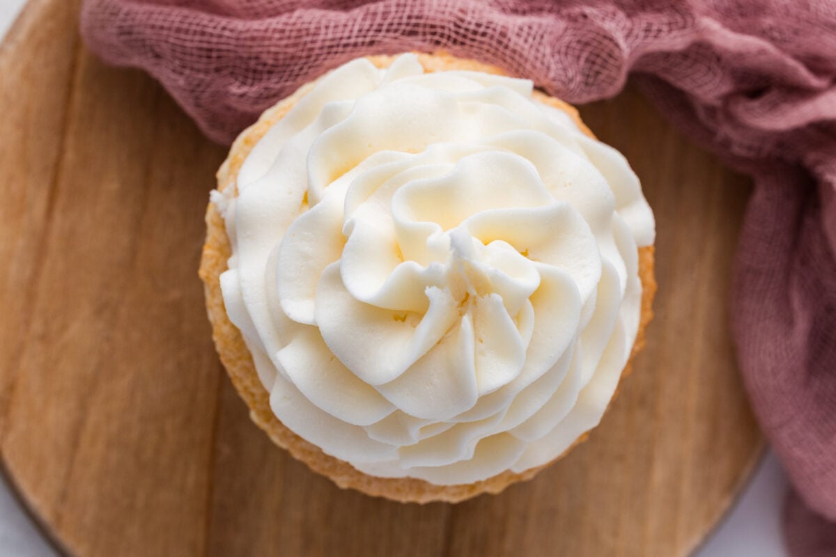 cream cheese frosting on a cupcake