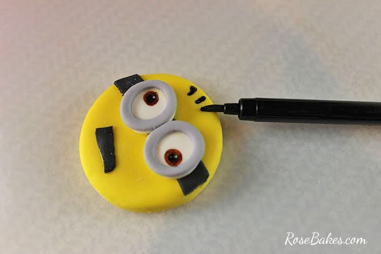 cupcake fondant toppers being painted