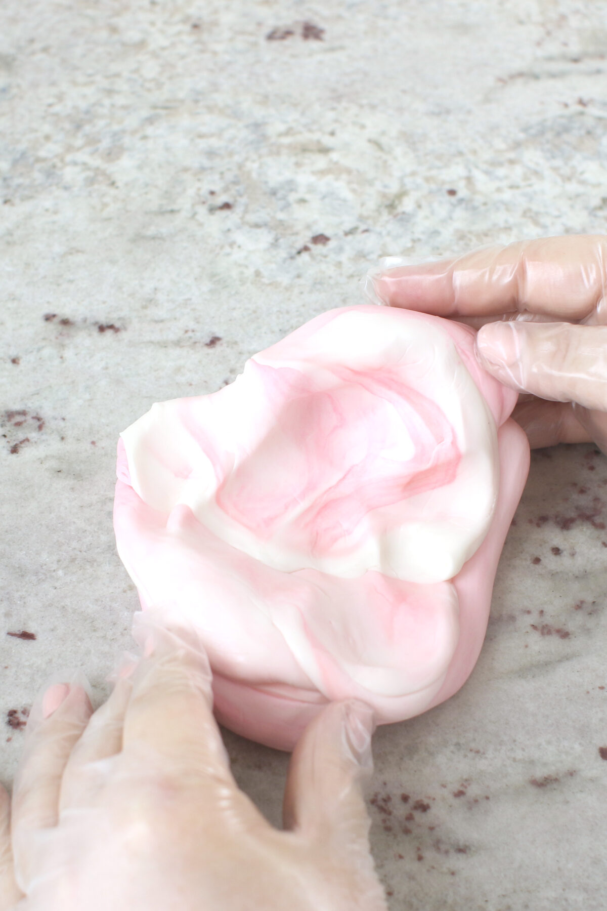 kneading pink into fondant