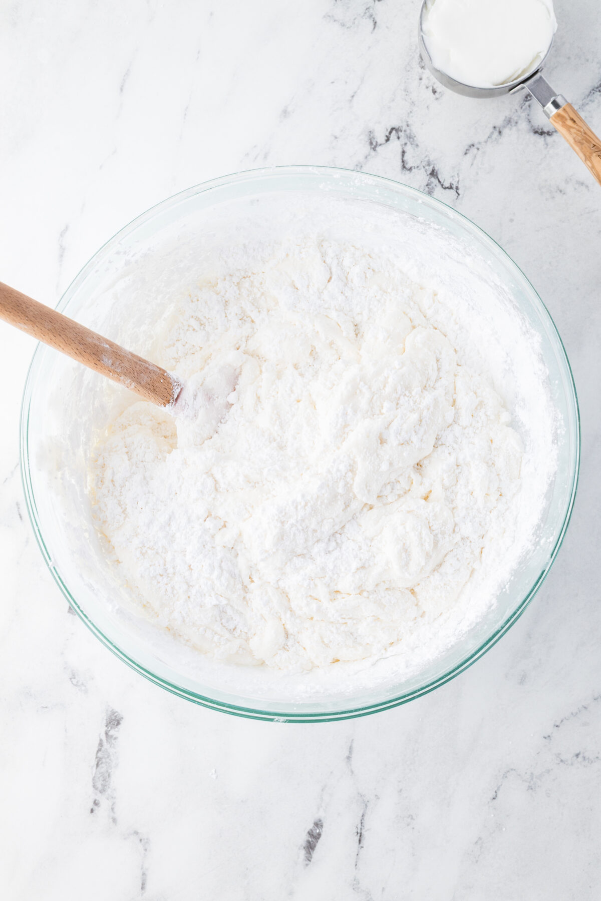 powdered sugar added to melted marshmallows