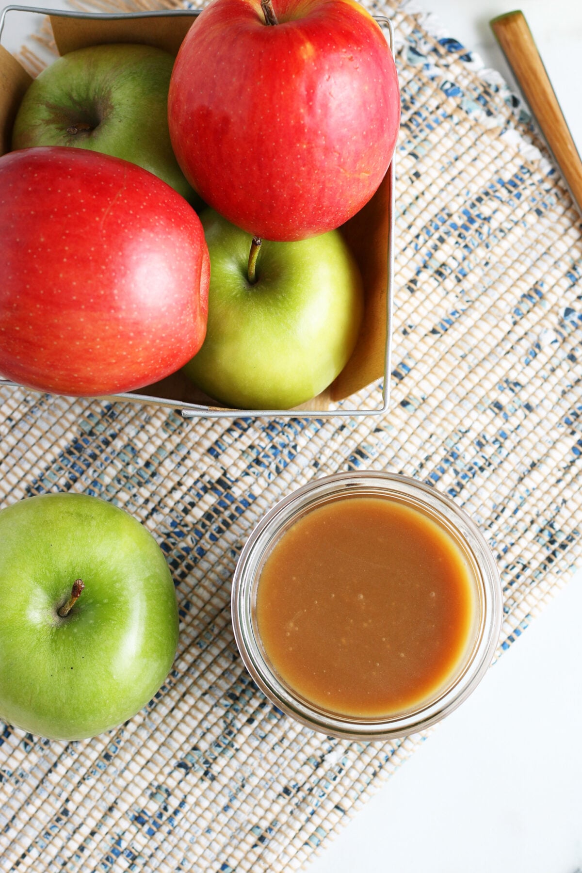 homemade caramel with a box of apples