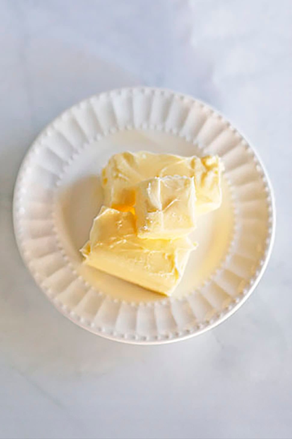 butter on a small white plate