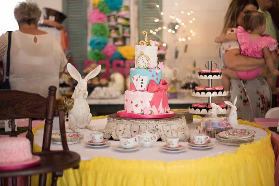 Three tier alice and wonderland cake
