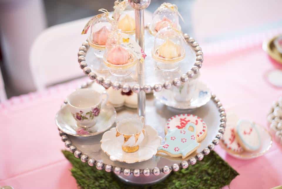 two tier tower with various decoration and sweets