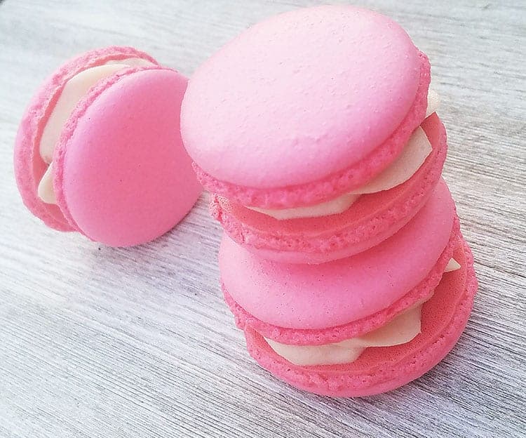 Strawberry Cheesecake Macarons on gray background