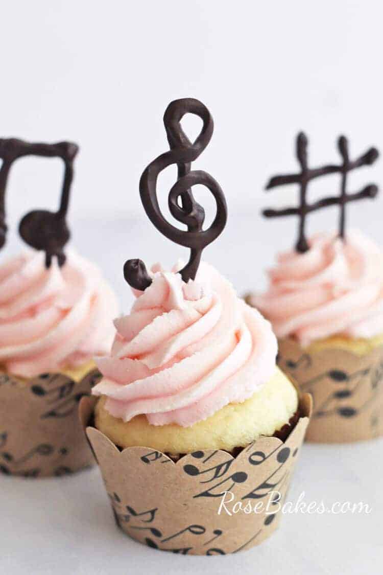 White Cupcakes with Pink Buttercream and Chocolate Music Note Toppers