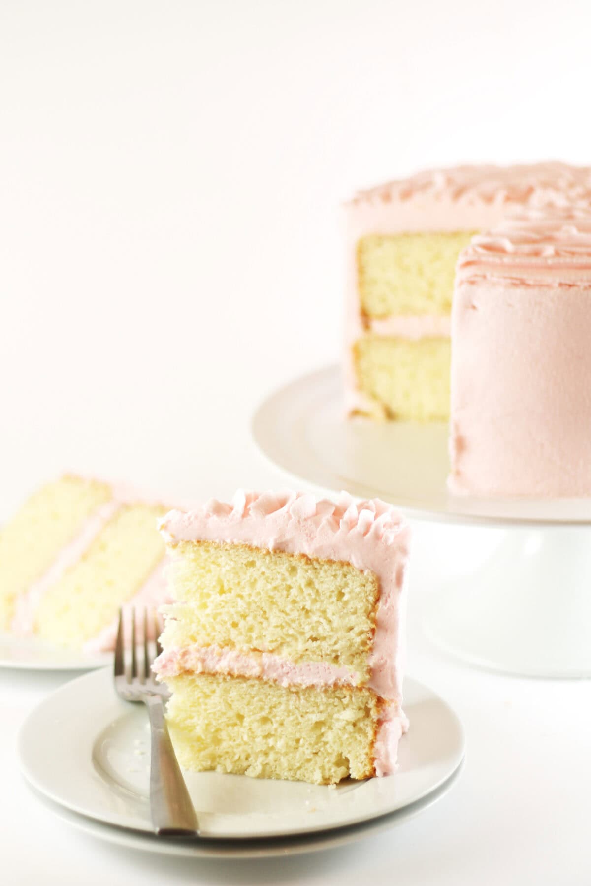 white almond sour cream cake sliced