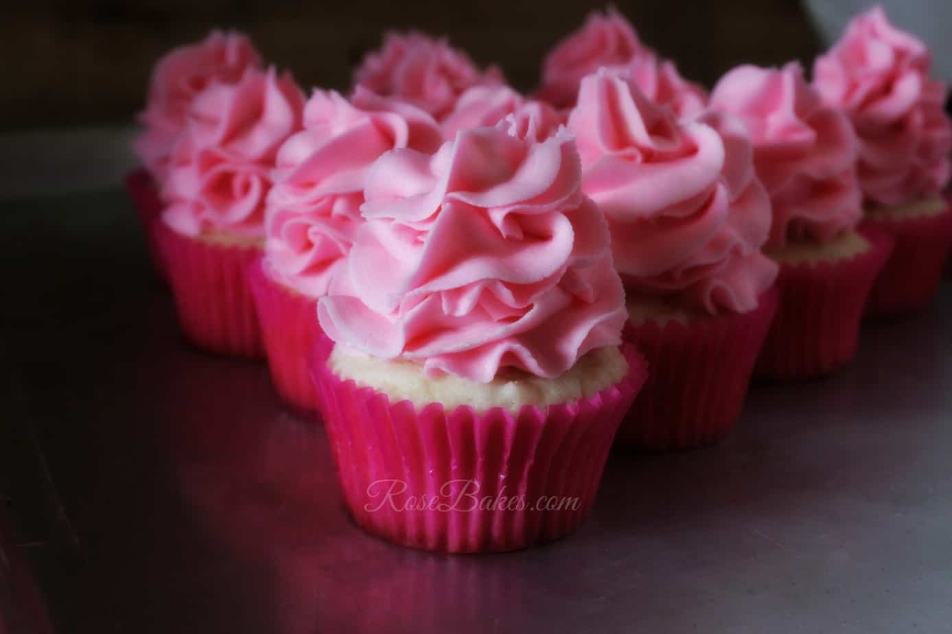 Cupcakes with pink frosting on top