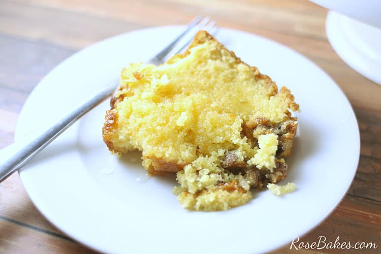 Slice of Rum Cake on White plate with fork