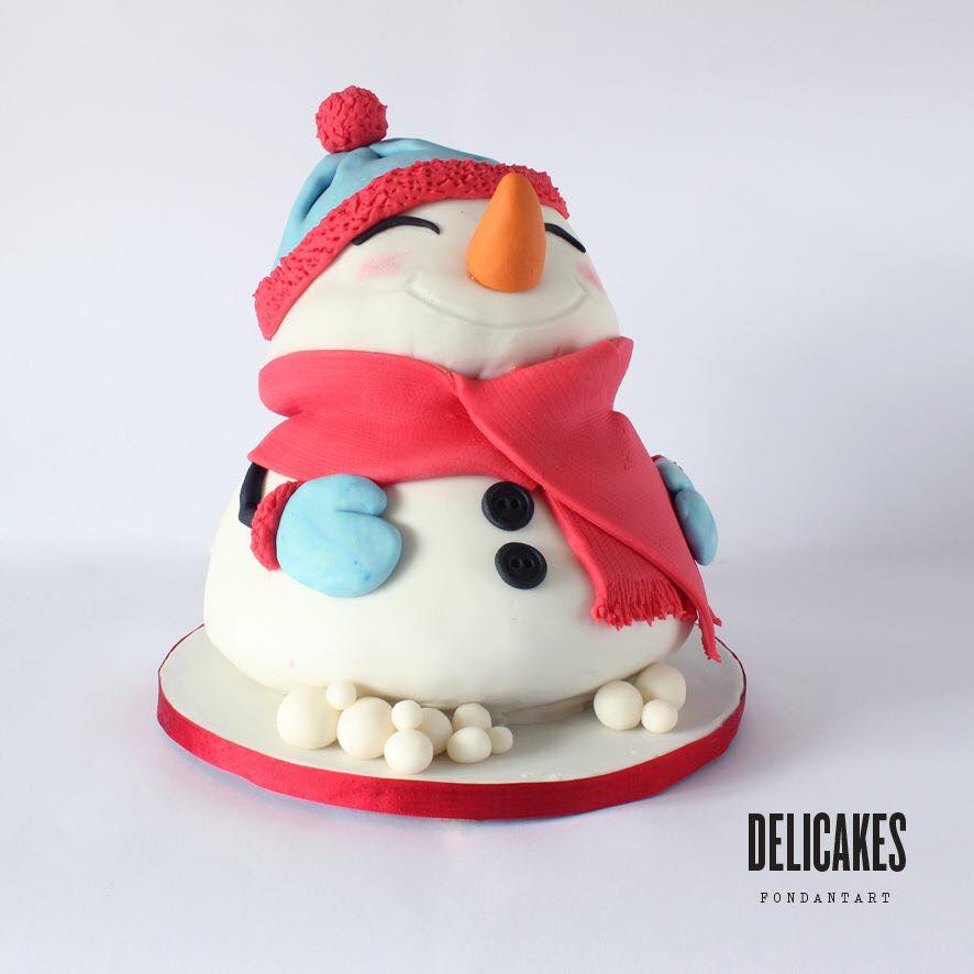 2 tiered carved Chubby Snowman Christmas Cake