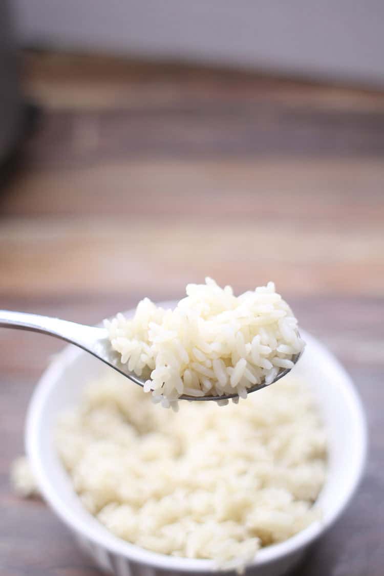 perfect bowl of white rice made in instant pot with spoon
