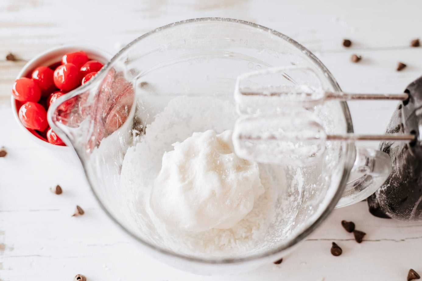 fondant ingredients in mixing bowl formed into a dough