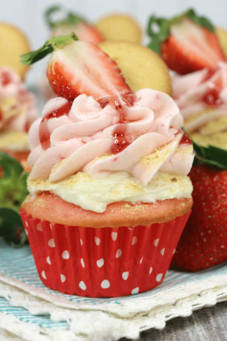 The Best Strawberry Cheesecake Cupcake Recipe | This strawberry cheesecake cupcake recipe is by far the best! It is so easy and will surely impress. Add this recipe on Pinterest NOW so you will always have it on hand! | https://butterysweet.com/blog/the-best-strawberry-cheesecake-cupcake-recipe