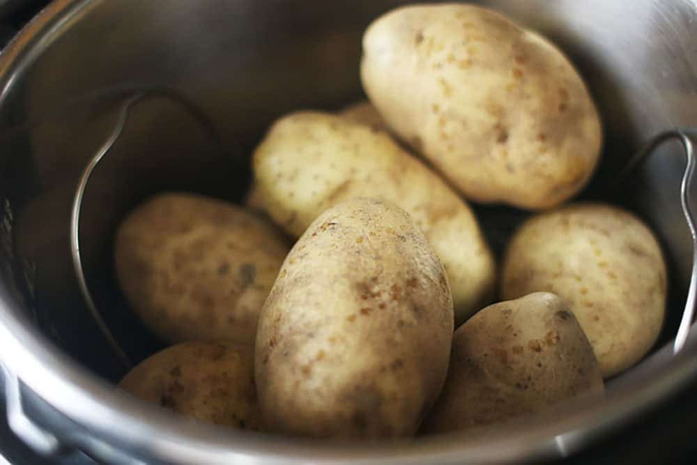 washed potatoes in instant pot on a trivet