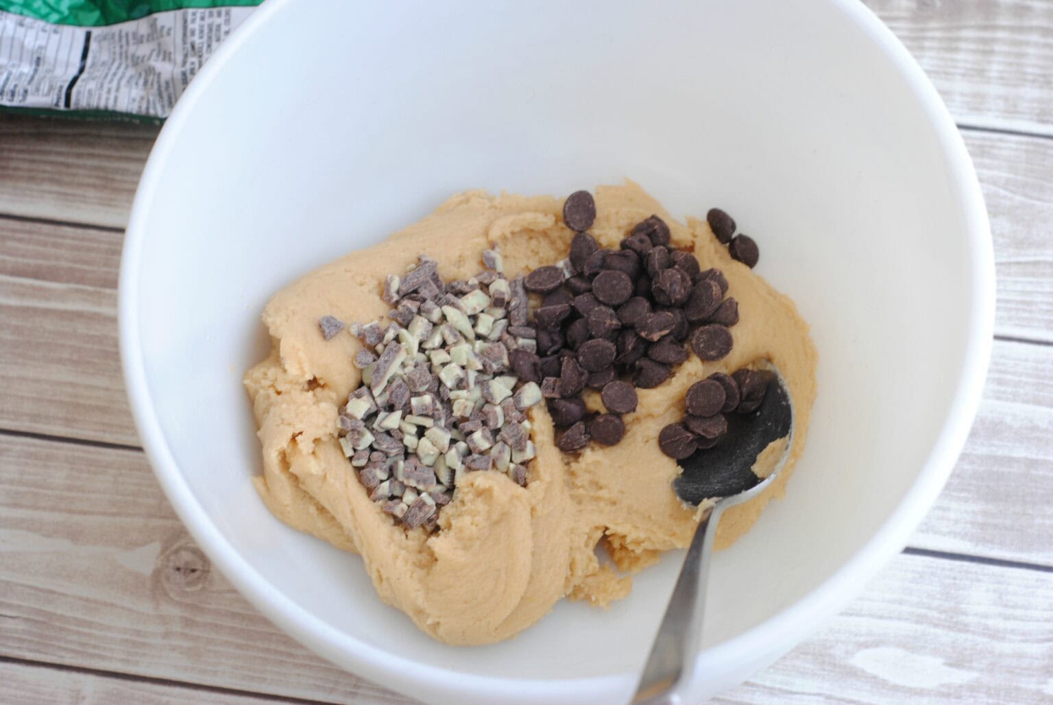 adding andes mint chips and chocolate chips to cookie dough batter