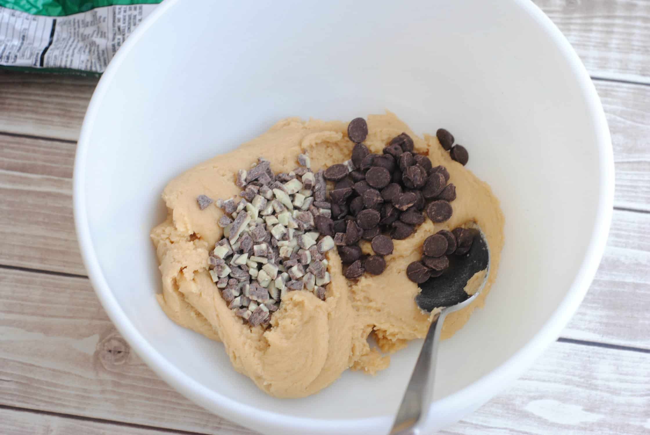 adding andes mint chips and chocolate chips to cookie dough batter