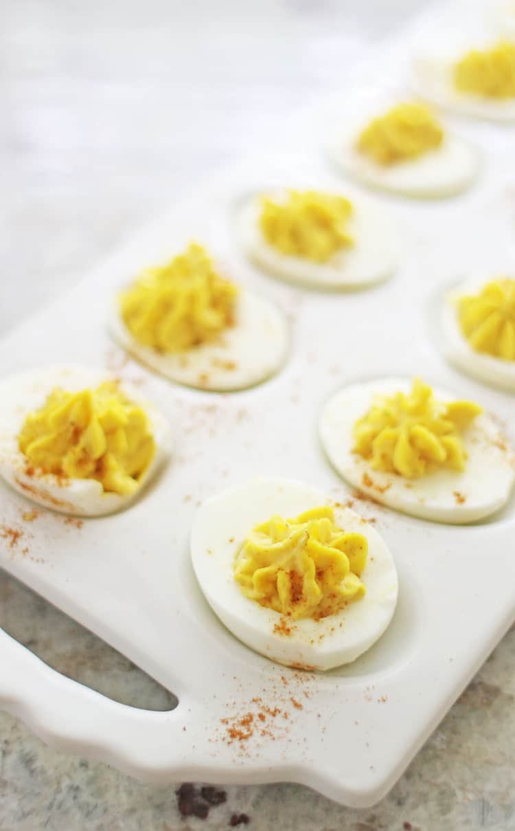 perfect classic deviled eggs for easter on white platter