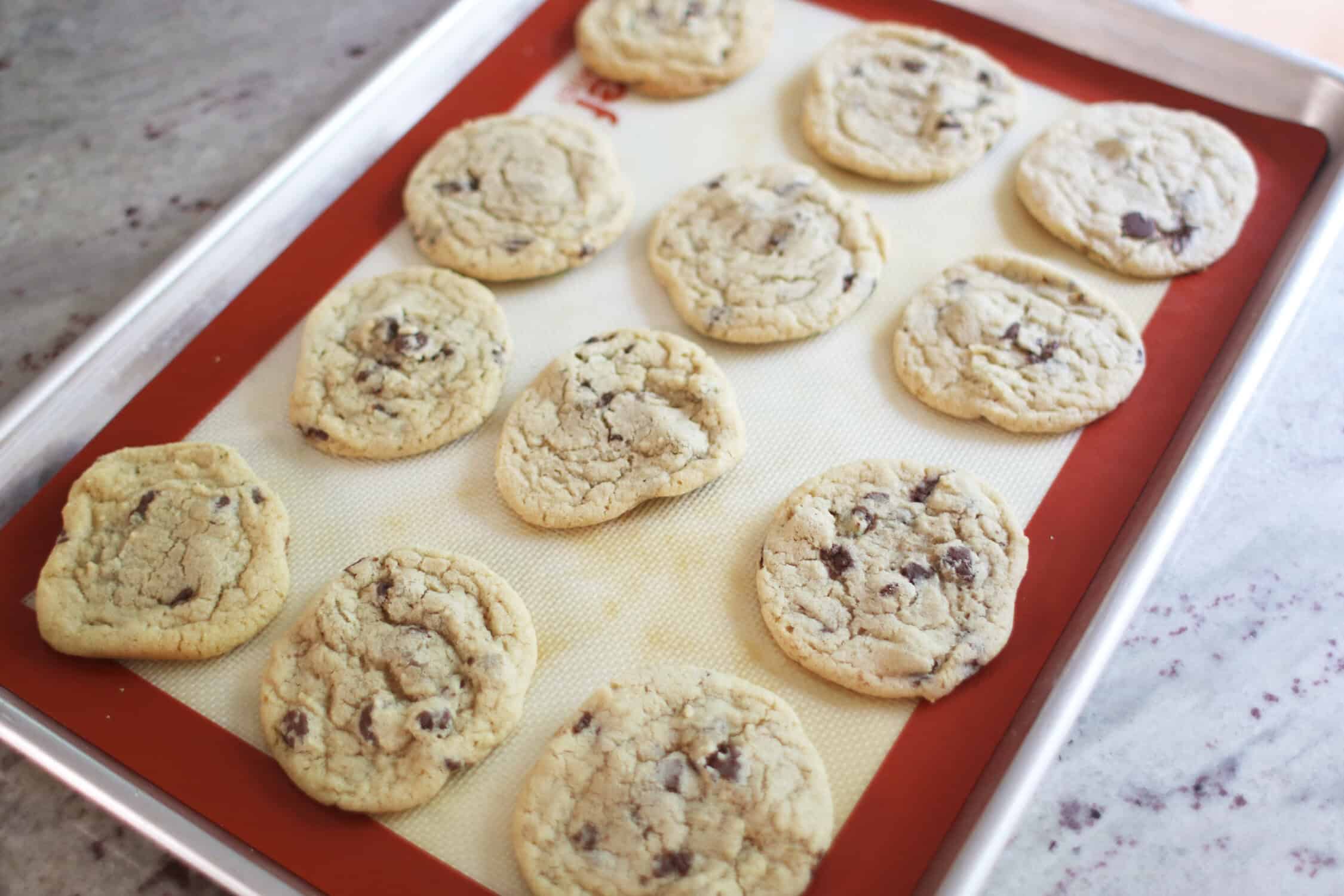 mint chocolate chip cookies on a cookie sheet