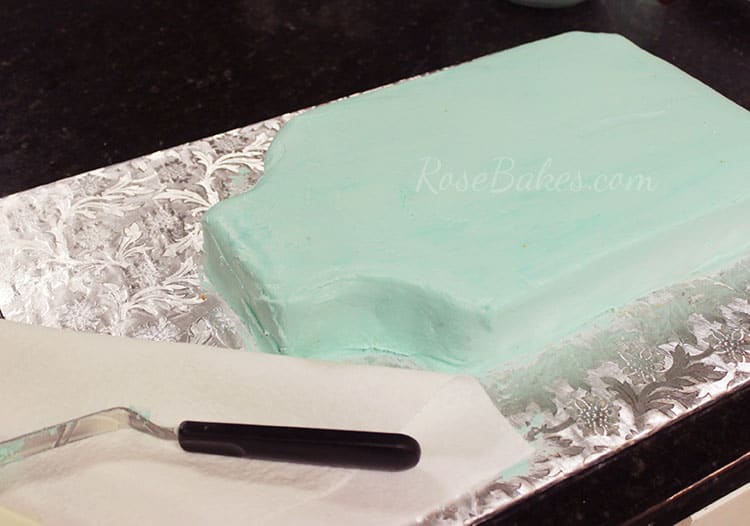 Cake frosted in blue buttercream for "Having a Ball" Mason Jar Cake with Flowers 