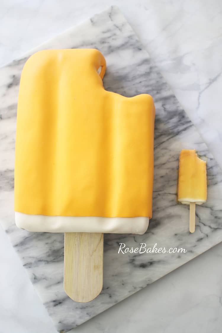 orange creamsicle cake or dreamsicle cake on a marble slab