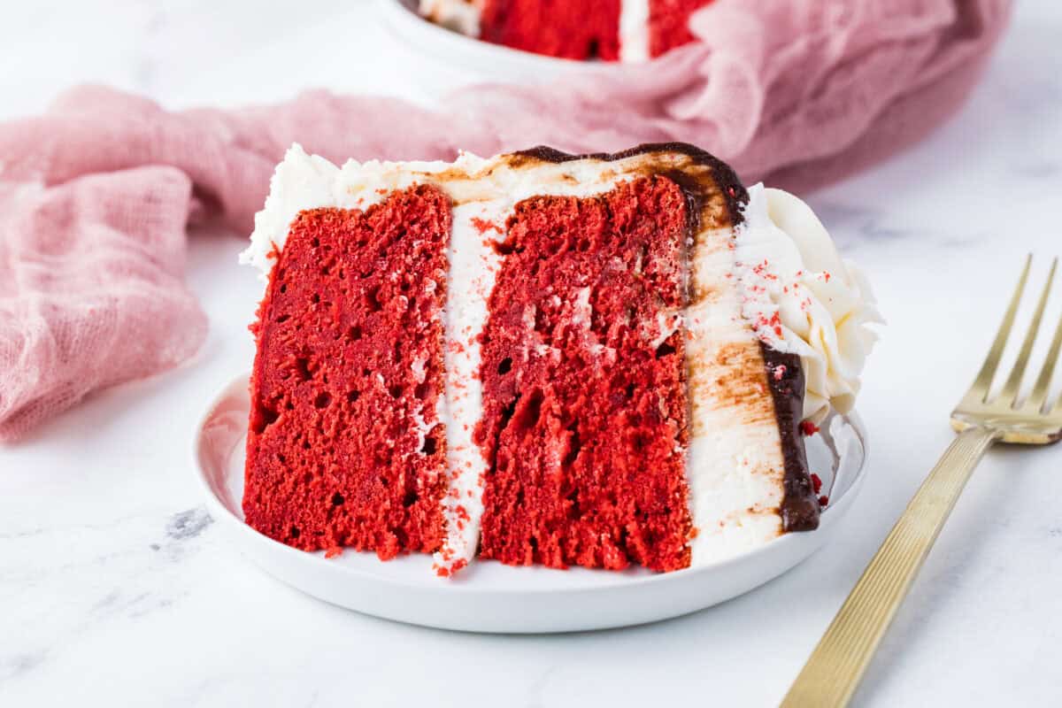 slice of red velvet cake on a white plate
