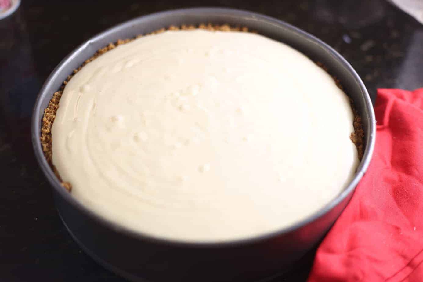 eggnog cheesecake filling into gingersnap crust
