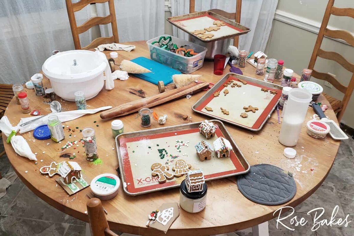 messy kitchen after decorating gingerbread houses