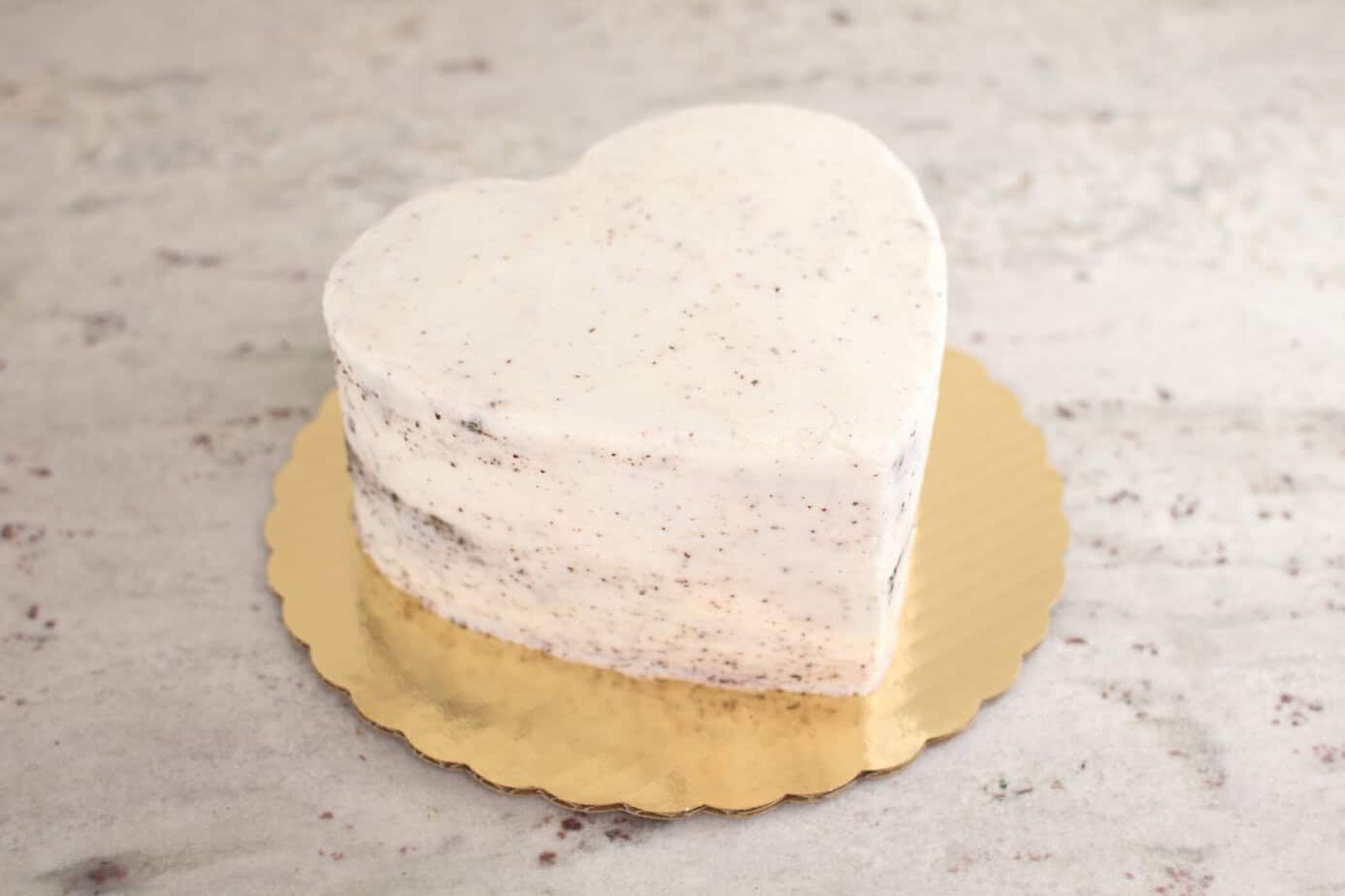 crumb coated heart cake