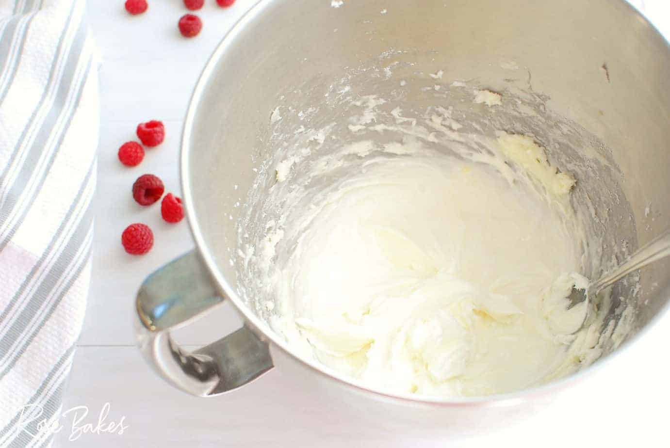 Raspberry Cinnamon Rolls icing in mixing bowl
