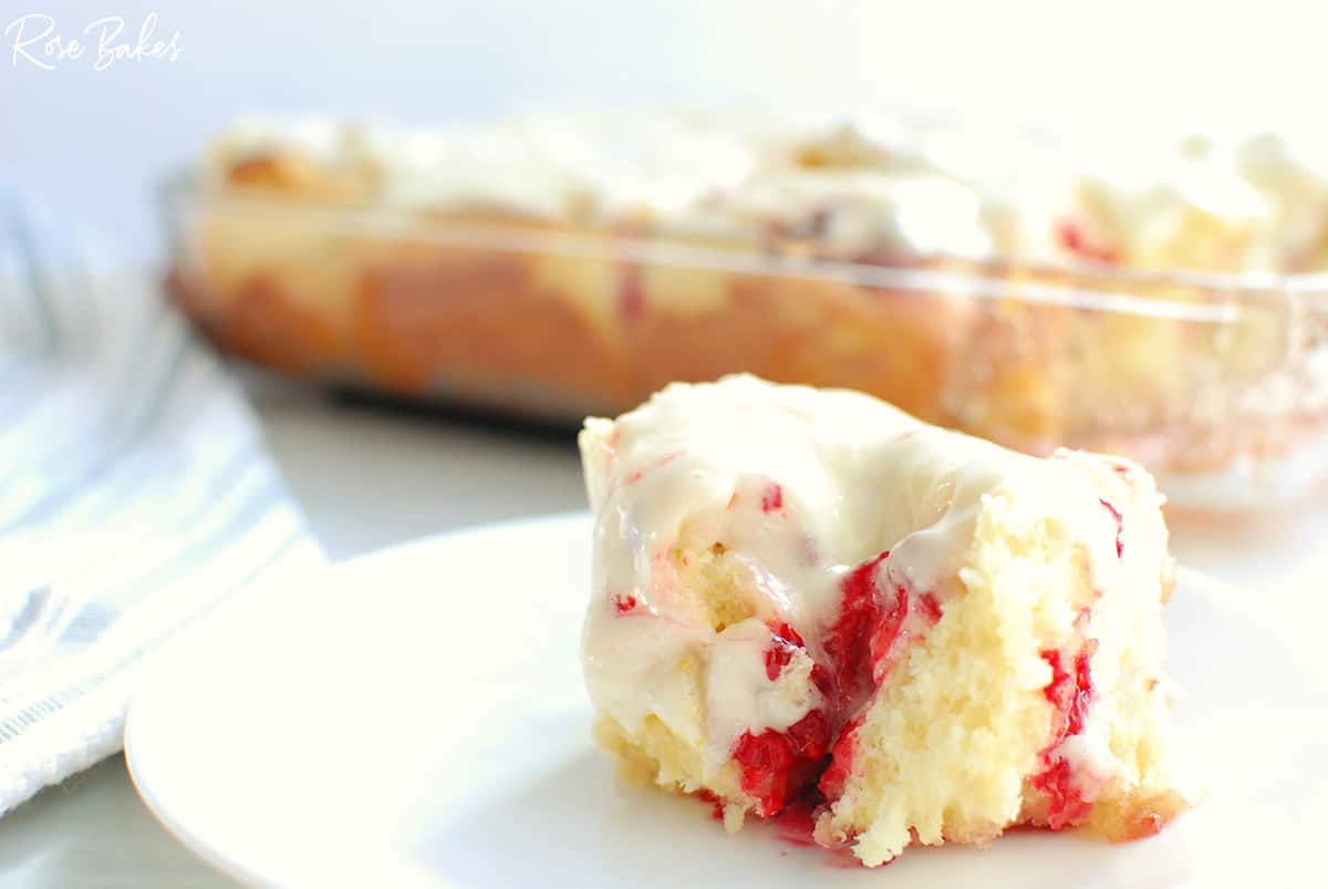 Raspberry Cinnamon Roll on white plate