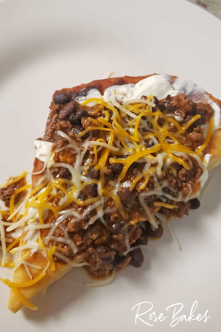 indian fry bread with taco meat, cheese and sour cream