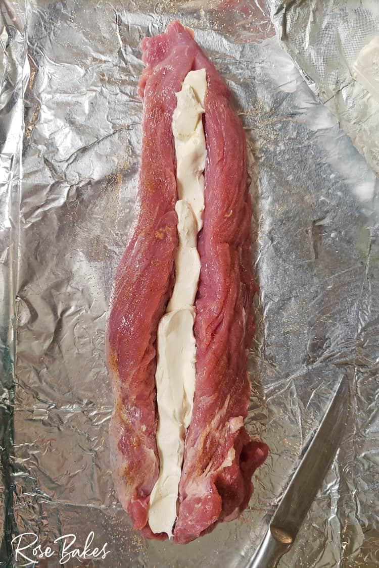 Pork loin sliced lengthwise stuffed with cream cheese