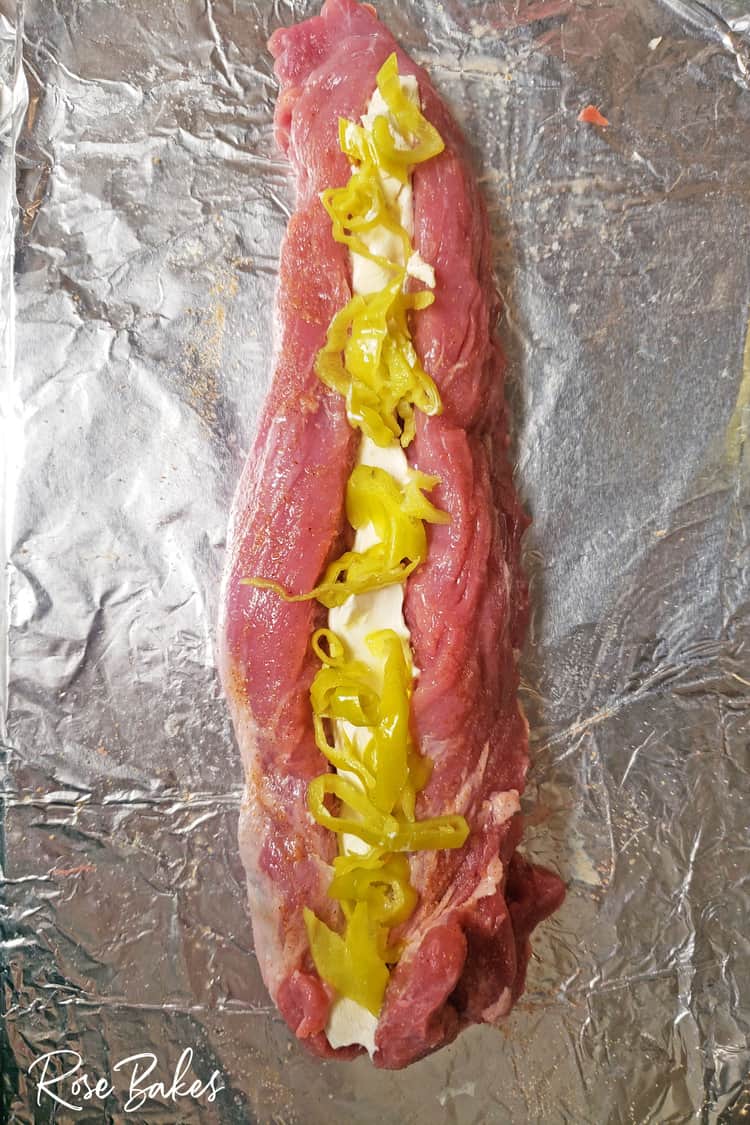 Pork loin sliced lengthwise stuffed with cream cheese and pepperoncini