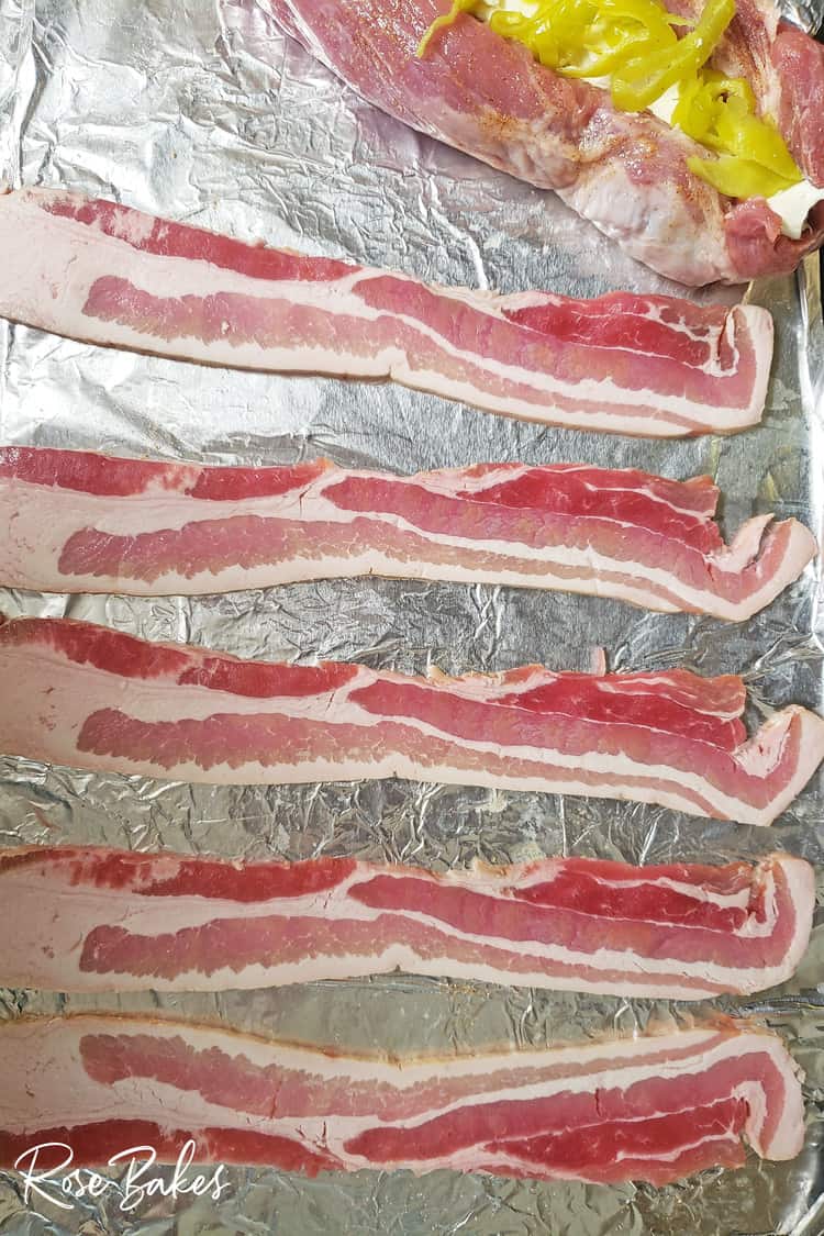 bacon layed out on baking sheets
