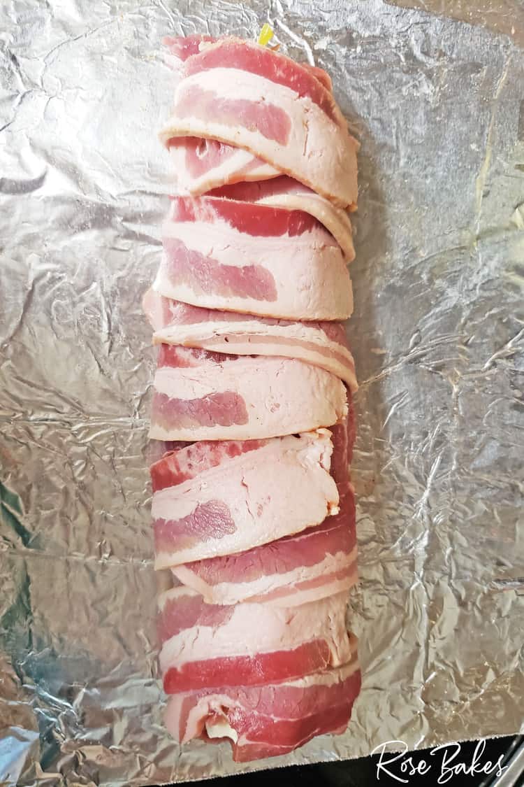 Pork loin sliced lengthwise stuffed with cream cheese and pepperoncini and wrapped in bacon