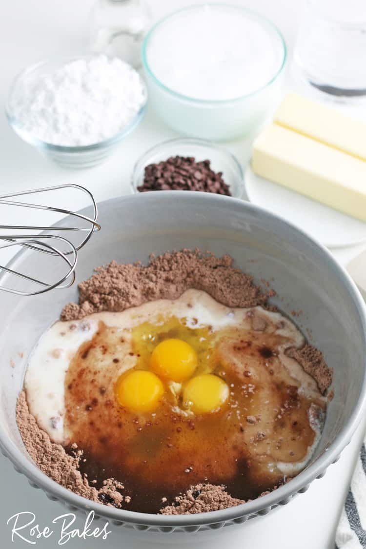 mixing bowl with ingredients for chocolate cake