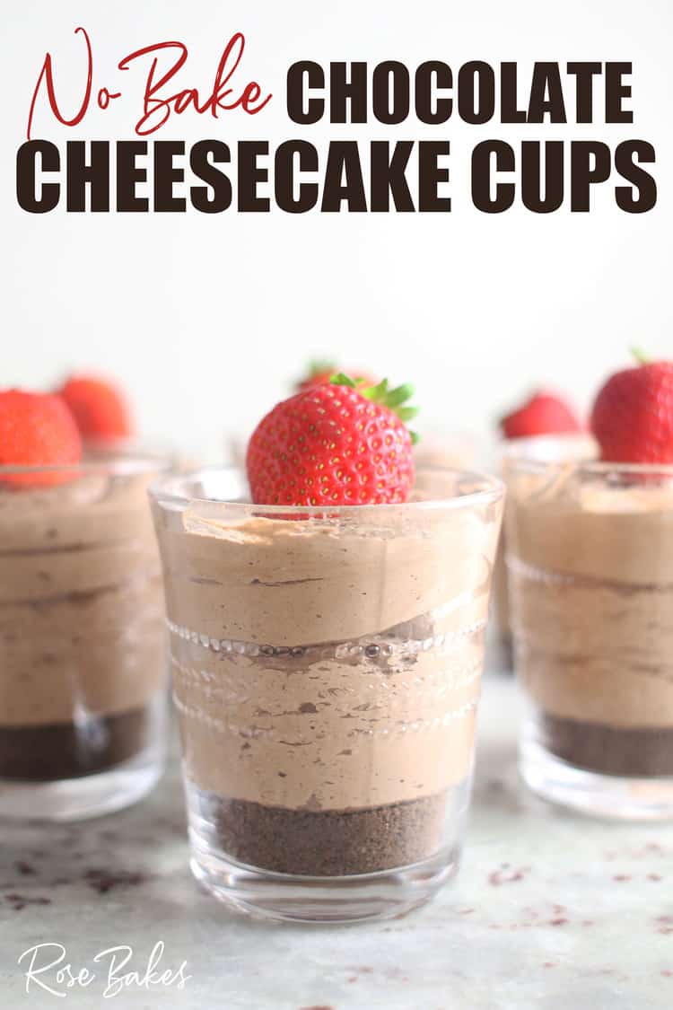 Creamy No-Bake Chocolate Cheesecake Cup in small clearglass with cookie crust and topped with strawberry