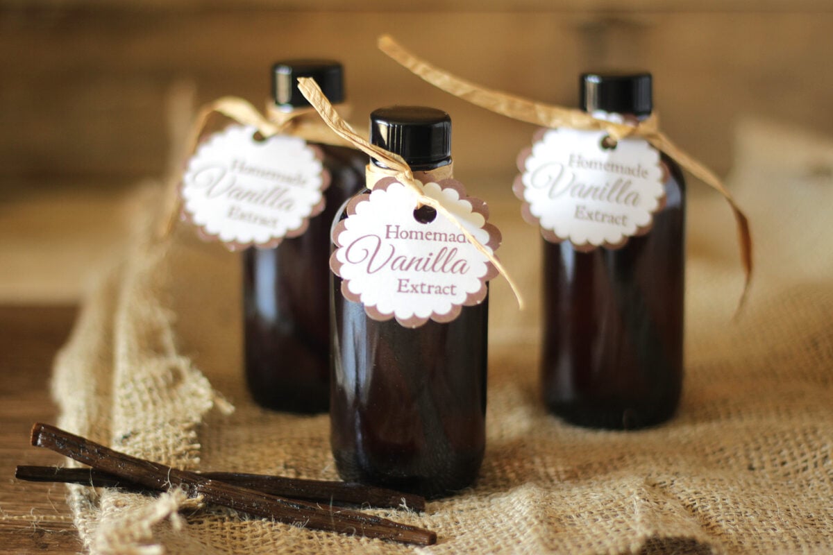 small bottles of homemade vanilla extract with tag and label for gifting