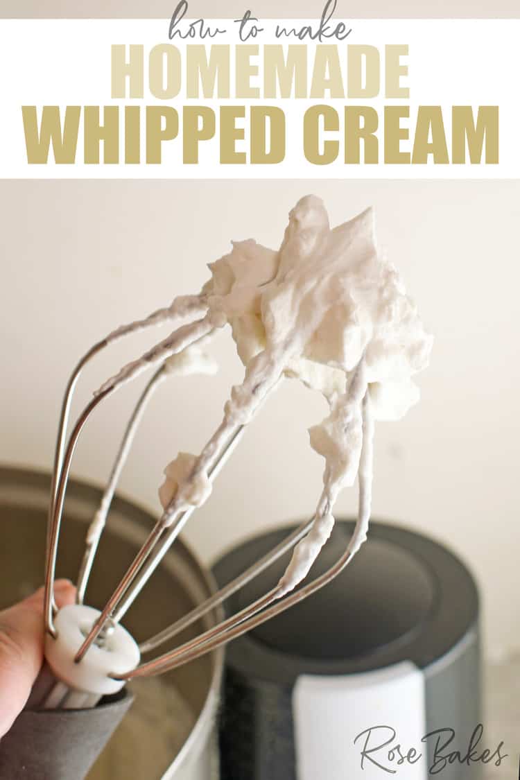 Fluffy whipped cream on the end of the whisk attachment of a Bosch Mixer. Text at the top of the image reads, How to make homemade whipped cream.