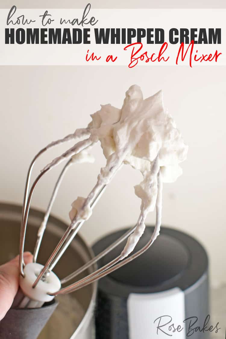 Fluffy whipped cream on the end of the whisk attachment of a Bosch Mixer. Text at the top of the image reads, How to make homemade whipped cream.
