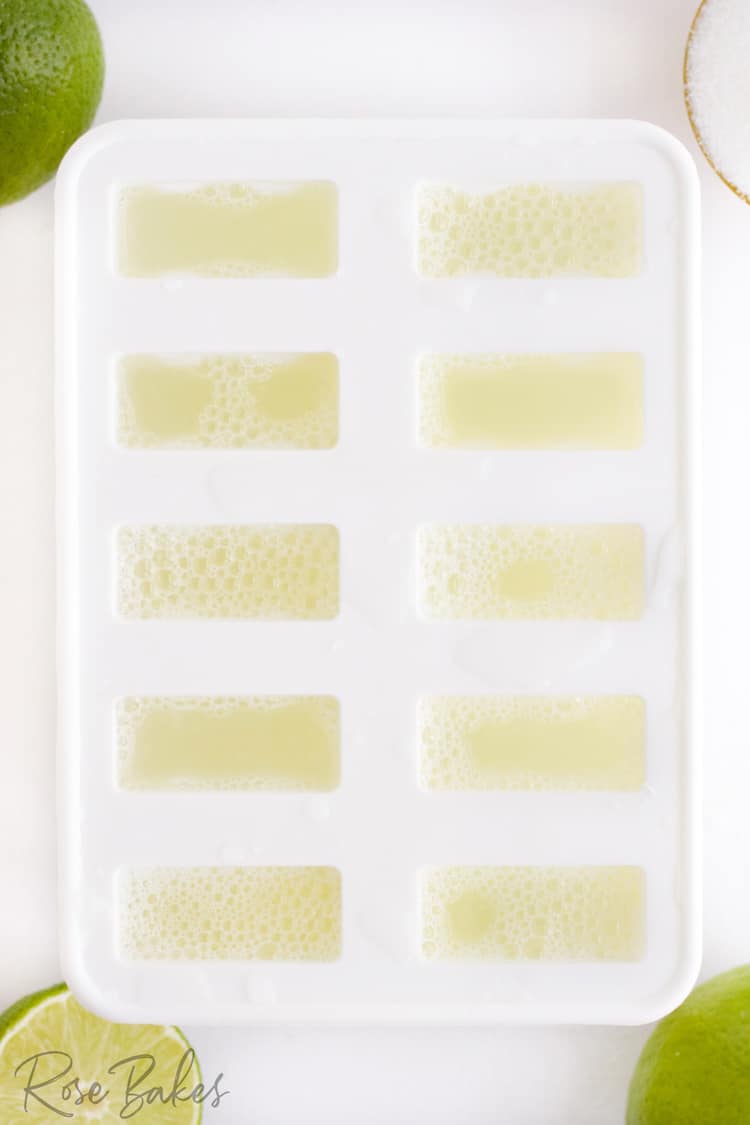 white popsicle mold filled with the mixture.