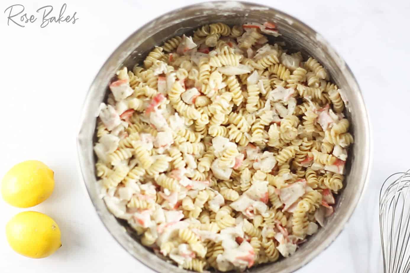 Creamy Crab Pasta Salad in a silver bowl