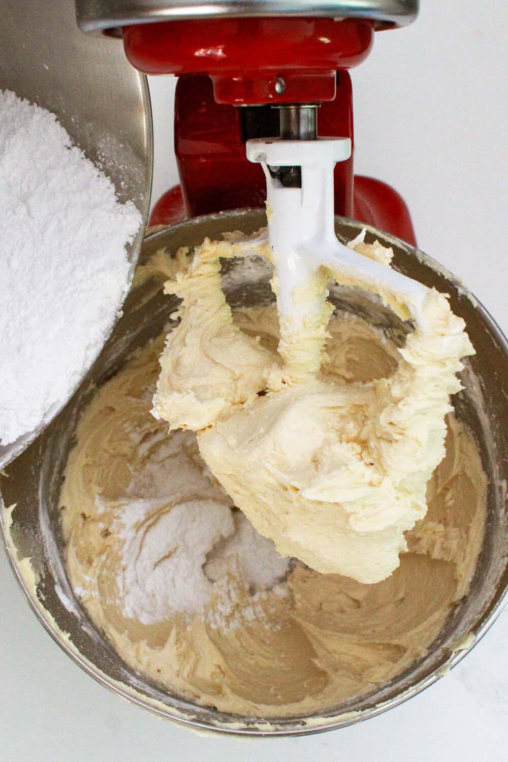 adding flour and powdered sugar to brown sugar mixture