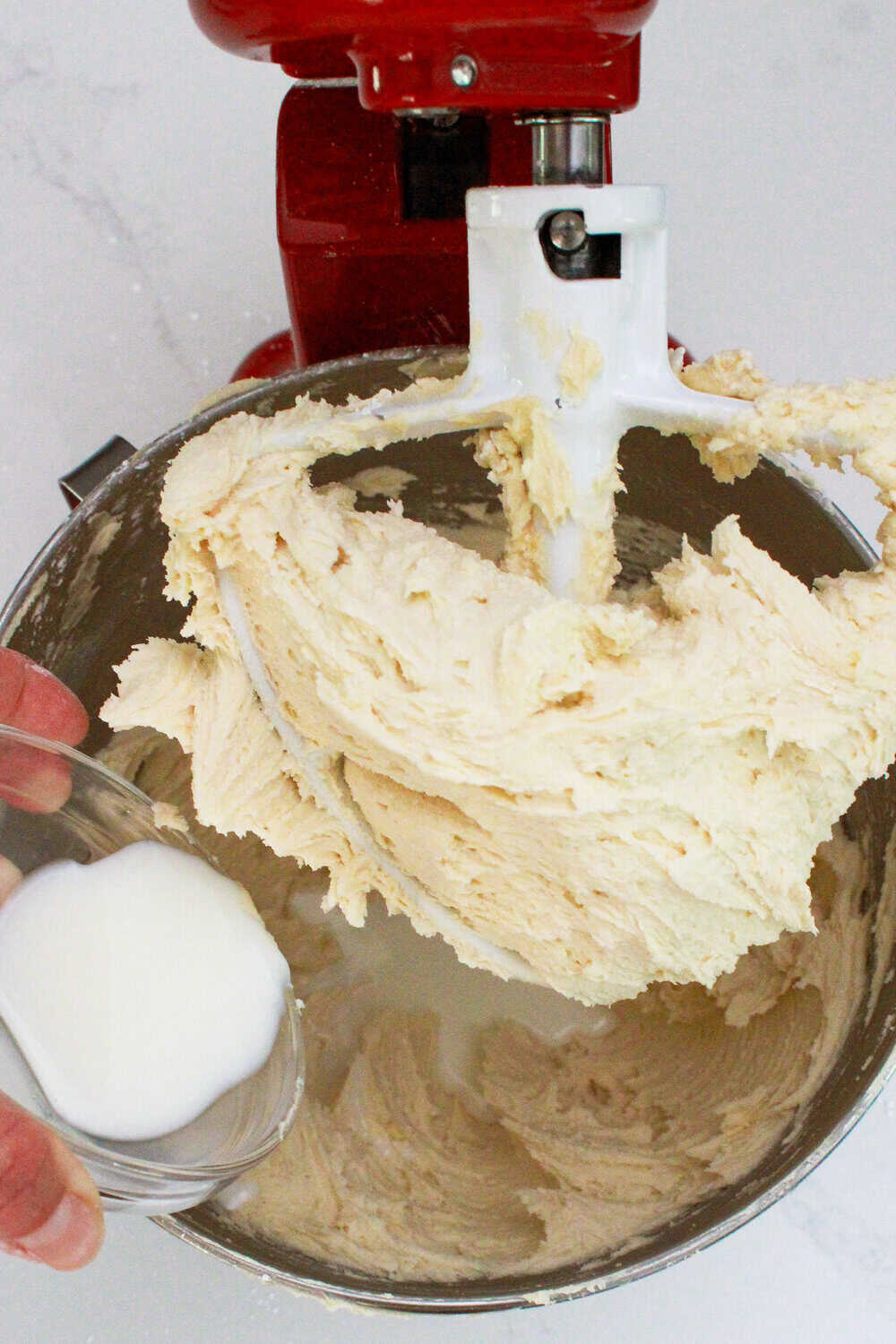 adding milk to brown sugar frosting