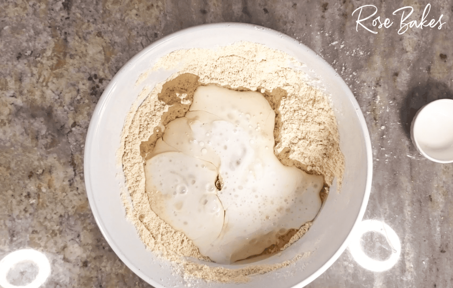 wet ingredients being added to dry