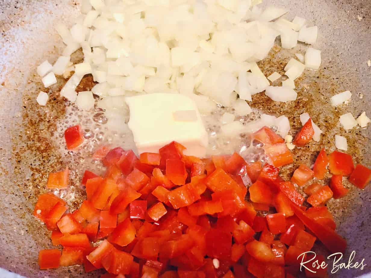 peppers and onion in skillet