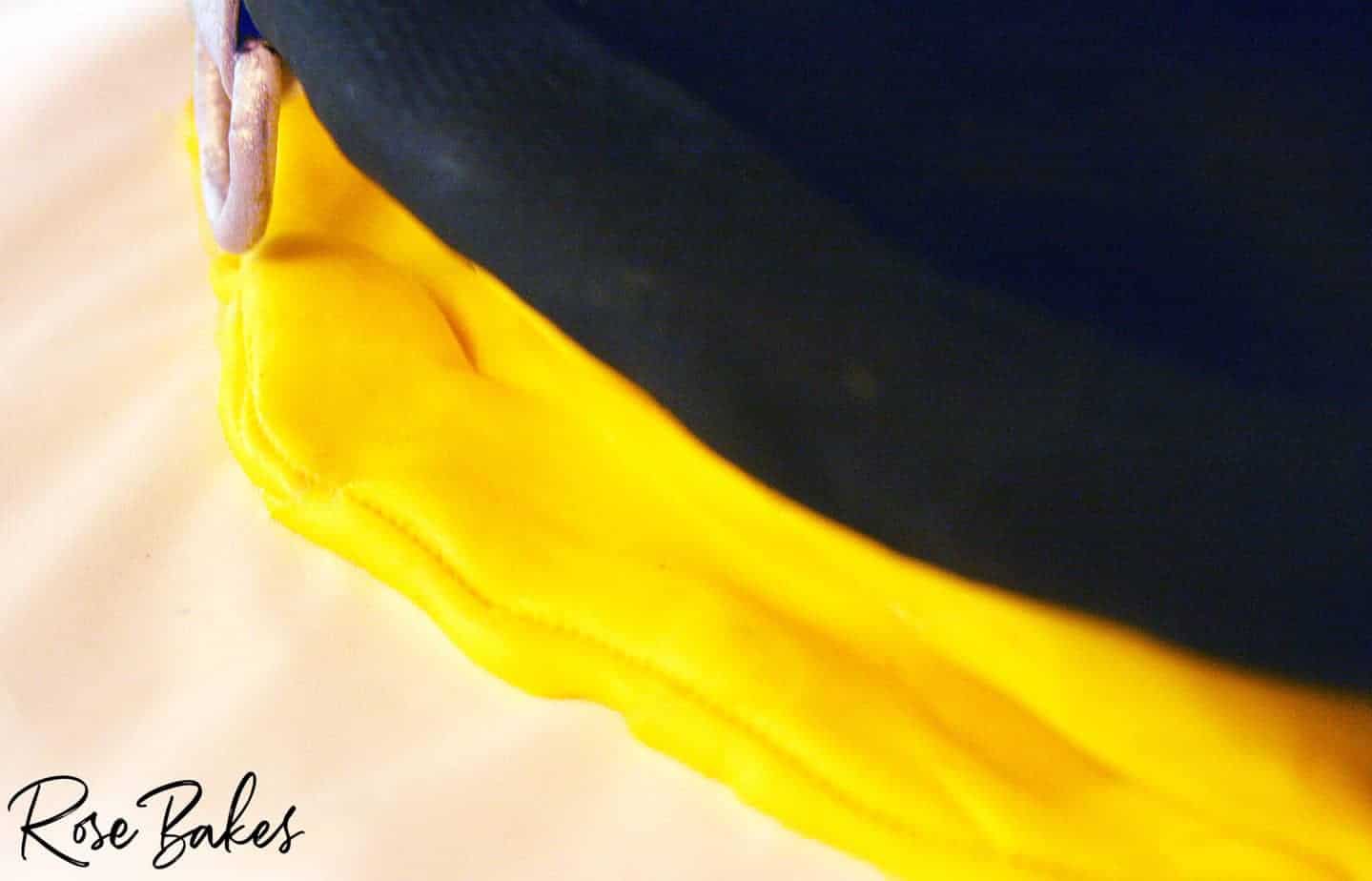 showing the yellow "fabric" on the back of the helmet made from fondant