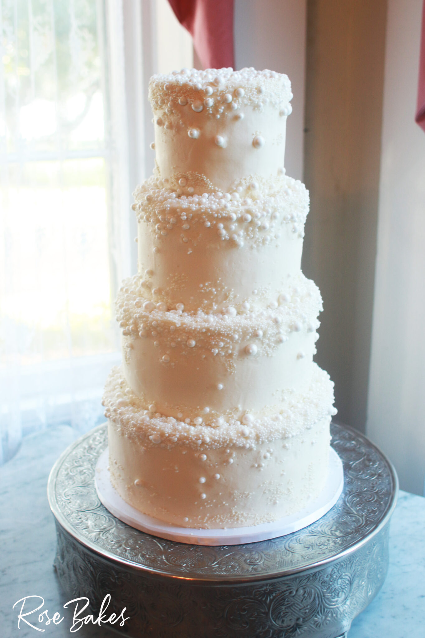 four tier Sugar Pearls Wedding Cake